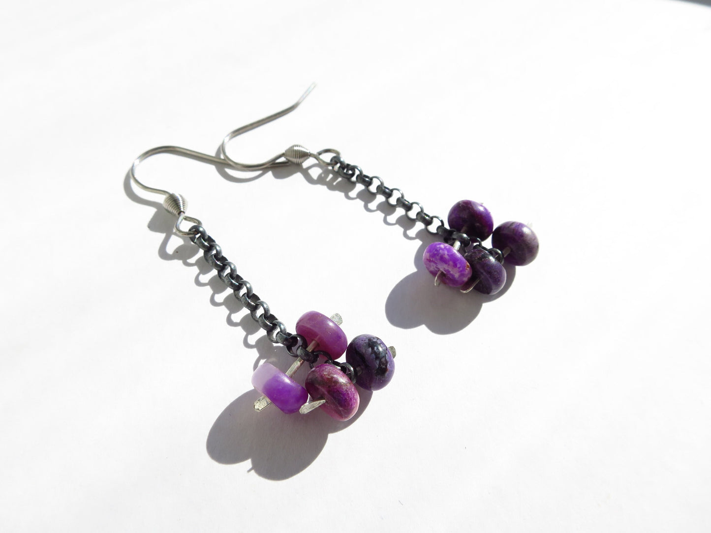Sugilite earrings 925 sterling silver blackened stainless steel ear hooks unique piece with sterling silver chain genuine sugilite Africa