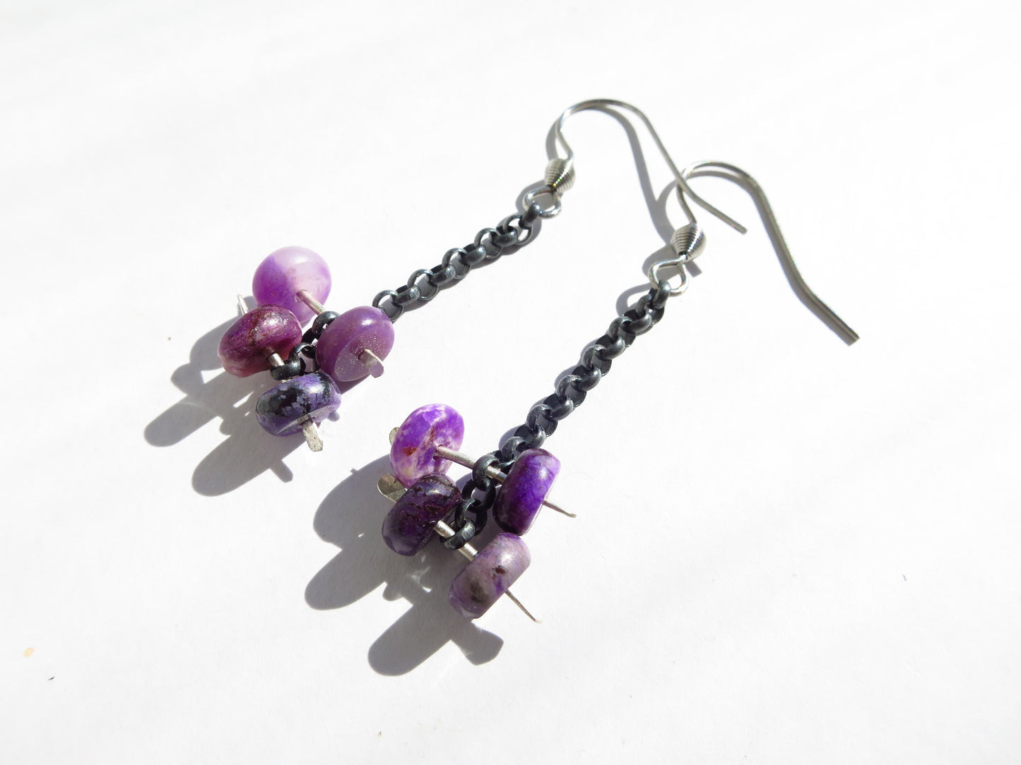 Sugilite earrings 925 sterling silver blackened stainless steel ear hooks unique piece with sterling silver chain genuine sugilite Africa